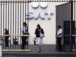 El SAT refirie que con el régimen se atienda una solicitud planteada por las organizaciones de pequeños contribuyentes. ARCHIVO /
