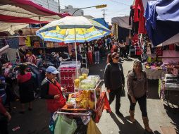 Policías acudieron por reportes de comerciantes.  /