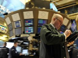 El Nasdaq Composite, de títulos bancarios, tecnológicos, industriales y de seguros reporta una leve ganancia de 3.32 puntos. ARCHIVO /