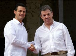 Juan Manuel Santos, presidente de Colombia y Enrique Peña Nieto, durante la VIII Cumbre de la Alianza Pacífico en Cartagena de Indias. EFE /