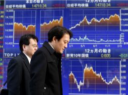 Las bolsas de Asia fueron en su mayoría en alza, mientras los inversores miraron hacia adelante a primeros comentarios de la Fed. AP /