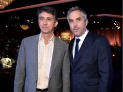 En la imagen los directores Alexander Payne y Alfonso Cuarón. AFP /
