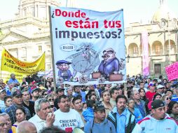 Los comerciantes afirman que el portal del SAT dificulta el cambio de régimen de pequeños contribuyentes al de incorporación fiscal. ESPECIAL /