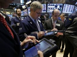 La Bolsa de Valores de Nueva York abre esta jornada con ganancias moderadas. AP /