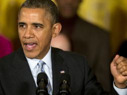 Barack Obama afirma que el aumento al salario mínimo es bueno para los negocios, trabajadores y la economía. AP /