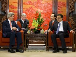 John Kerry y Li Keqiang, sus países reconocieron la necesidad urgente de adoptar medidas contra el cambio climático. AFP /