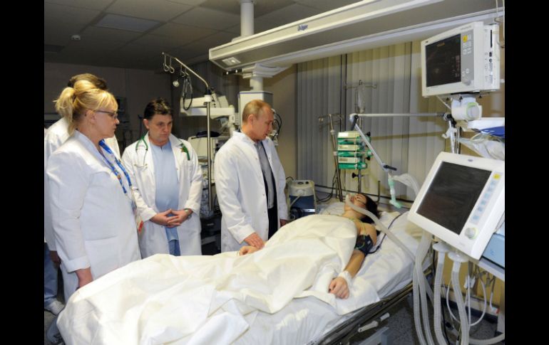 Después de una cirugía de seis horas, Maria pudo recibir al primer mandatario ruso. AFP /
