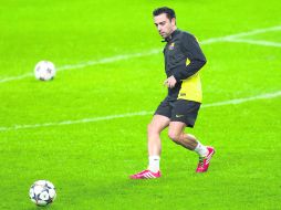 El motor. Xavi Hernández y el Barcelona reconocieron la cancha del Manchester City, donde hoy abren la fase de octavos de final. AP /
