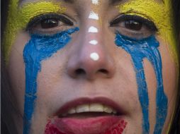 Venezuela vive una jornada de marchas de oposición y oficialismo. AP /