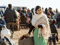 Luego de unas horas, la evacuación y entrega de ayuda humanitaria en Homs fue suspendida debido a disparos de un grupo armado. EFE /