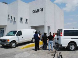 El Ministerio Público ordena el traslado del cuerpo del estudiante al Semefo. ARCHIVO /