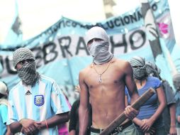 Tras la devaluación del peso y el alza de precios, se prevé que en los próximos meses la economía del país se desacelere. EFE /