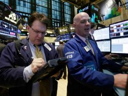 Fue una jornada de altibajos que se resolvió a favor de las pérdidas en la última media hora. AP /