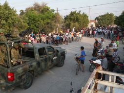 La Ruana en mayo de 2013. La fuerza del municipio se separó del consejo de autodefensas, ahora se designan pueblo soberano y autónomo. ARCHIVO /