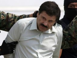 Joaquín ''El Chapo'' Guzmán, al momento de su breve presentación a los medios de comunicación en el aeropuerto del DF. AP /