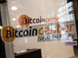 El bitcoin es una divisa electrónica que funciona como forma de pago de bienes y servicios. AFP /