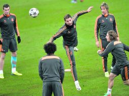 Encarrilados. Los merengues llegan de conquistar el liderato solitario en La Liga española. AP /