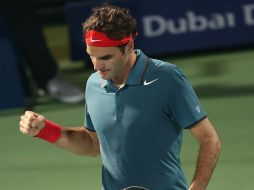 Roger Federer sufrió en en tres sets pero logró calificar a la tercera ronda. EFE /