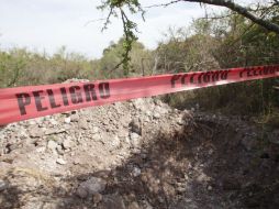 En días pasados se encontraron 19 cuerpos en una fosa clandestina en las inmediaciones de Cajititlán, Tlajomulco. ARCHIVO /