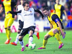 Si el club alemán no hace válida la opción de compra, Guardado volvería al Valencia, pues su contrato vence hasta el 2016. AP /