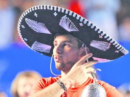 Alto. Luego de coronarse en Acapulco, Grigor Dimitrov escalará al puesto 16 de la clasificación. EFE /