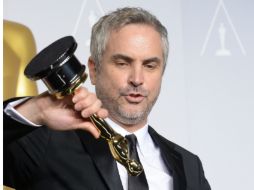 Alfonson Cuarón consigue la estatuilla a Mejor Director. AFP /