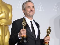 Cuarón hizo historia al ganar el Oscar de mejor director por 'Gravedad'. AFP /