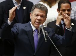 Santos está en el poder desde 2010 y busca obtener la mayoría en la próxima elección. AP /