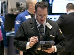 El índice compuesto Nasdaq fue el único que registró descensos. ARCHIVO /