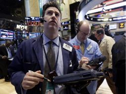 El índice compuesto del mercado Nasdaq terminó en números rojos. AP /