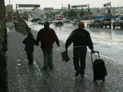 El sistema frontal 41 entrará al país y ocasionará lluvias moderadas en Jalisco. ARCHIVO /
