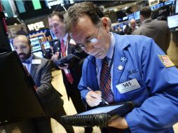 El Nasdaq Composite reporta un leve descenso de 0.70 puntos AFP /
