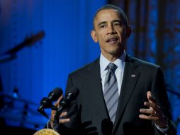 Obama estima que ocho millones de latinos podrían recibir subsidios para la compra de los nuevos planes médicos. AP /