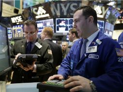 El tecnológico Nasdaq logró frenar una racha bajista de cuatro días y terminó con ganancias. AP /