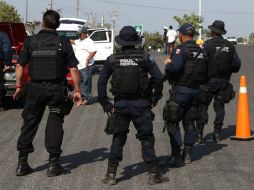 Ayer miércoles se informó que los mandos y varios policías fueron detenidos en flagrancia, cuando cobraban el monto de una extorsión. ARCHIVO /