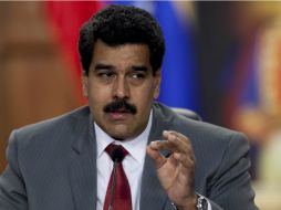 Maduro afirma que desea reunirse con la MUD, debido a que es tiempo de altruismo no de partidismo. AP /
