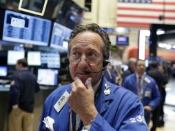 La jornada se había recuperado tras conocerse tres indicadores que los inversores interpretaron como impulsores a las compras. AP /