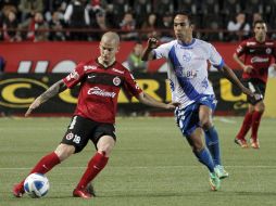Los Xolos madrugaron al puebla, al anotarles el primer gol del encuentro en el primer minuto de juego. NTX /
