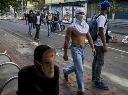 Al menos 33 personas han muerto a causa de las violentas protestas contra Nicolás Maduro. ARCHIVO /