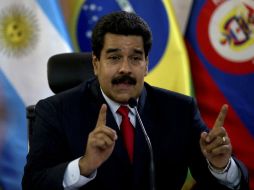 ''Si Venezuela fuera desestabilizada, tengan la seguridad de que nosotros jamás nos entregaríamos'', asegura Maduro. AP /