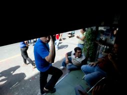 El apagón afectó a trabajadores y a ciudadanos del oeste de Caracas. AP /