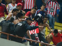 Reconocen indignación entre policías, pero les piden mantener su profesionalismo y tratar con dignidad el uniforme que portan. ARCHIVO /