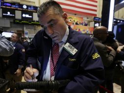 Wall Street se dejaba llevar por el optimismo de sus colegas al otro lado del Atlántico. AP /
