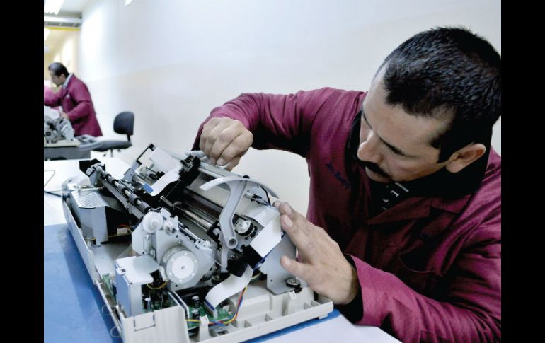 Costo. La revaluación del yuanes una factor que analizan las empresas. AP /