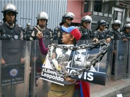 Venezolanos piden la liberación de los detenidos, entre ellos el líder opositor, Leopoldo López. AP /