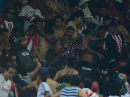Consideran que el uso de protocolos obsoletos podría ser la respuesta de por qué se desató el desorden en el Clásico Tapatío. ARCHIVO /