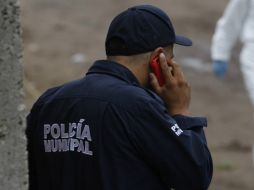 La policía municipal informó que acudieron a la escena del doble crimen. Sin embargo, no explicaron cómo sucedieron los hechos. ARCHIVO /