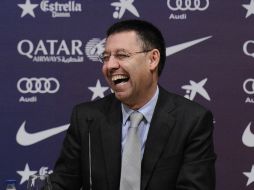 El presidente del equipo Josep María Bartomeu dicen que son un modelo ejemplar. AP /