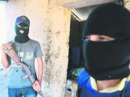 El Gobierno brinda la oportunidad a los autodefensas para que quienes deseen registrarse al Mando Único Policial, lo hagan. AFP /