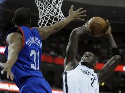 Garnett en 30 minutos de actividad sobre la duela consiguió que su equipo rompiera una mala racha. AP /